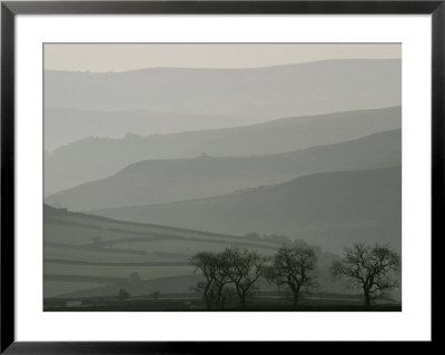 The Early Morning Mist Covers The Rolling Hills Of Derbyshire by Annie Griffiths Belt Pricing Limited Edition Print image