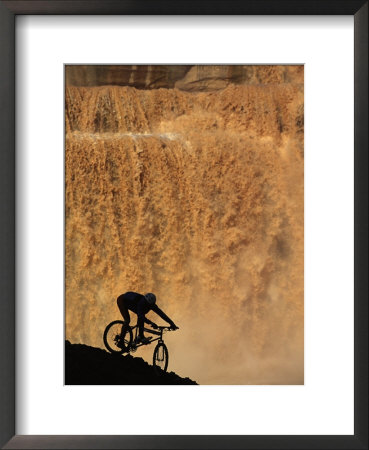 Mountain Biker Pedals Past Rushing Winter Snow Melt At Grand Falls by Bill Hatcher Pricing Limited Edition Print image