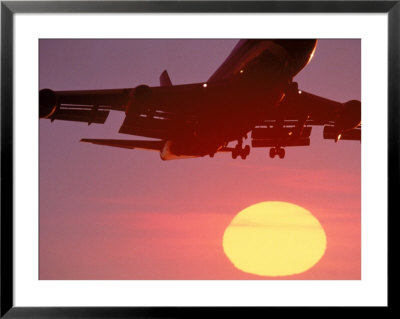 Airplane In Flight During Sunrise, Sunset by Mitch Diamond Pricing Limited Edition Print image