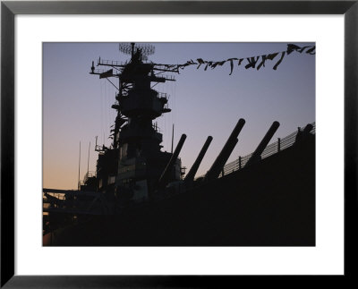 Silhouette Of The Battleship U.S.S. Wisconsin At Port In Norfolk by O. Louis Mazzatenta Pricing Limited Edition Print image