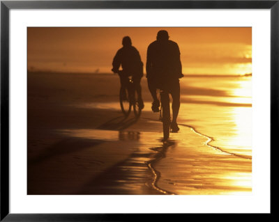 Couple Biking Toward Sunset, Monterey, Ca by Hal Gage Pricing Limited Edition Print image