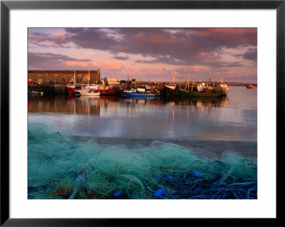 Fishing Boats Moored Alongside Kilronan Pier, Connaught, Ireland by Richard Cummins Pricing Limited Edition Print image