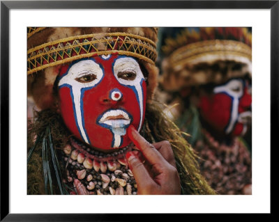 A Tribal Woman Decorated With Shell Necklaces And Bright Face Paint by Jodi Cobb Pricing Limited Edition Print image