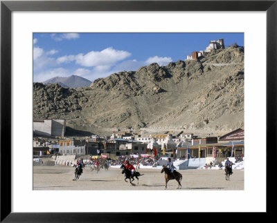 Game Of Polo On Leh Polo Field, Tsemo Gompa On Ridge Behind, Leh, Ladakh, India by Tony Waltham Pricing Limited Edition Print image