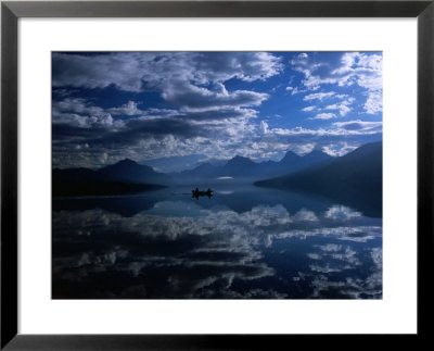 Early Morning Boating In Reflected Sea Of Clouds, Lake Mcdonald, Glacier National Park, Montana by Gareth Mccormack Pricing Limited Edition Print image