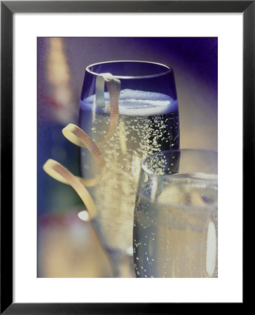 Champagne In Glasses With Ribbon And Bottle Behind by Eric Kamp Pricing Limited Edition Print image