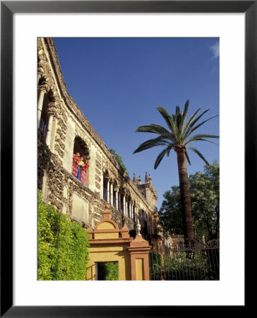 Young Women In Flamenco Dresses Under Arch In The Alcazar, Cordoba, Spain by John & Lisa Merrill Pricing Limited Edition Print image