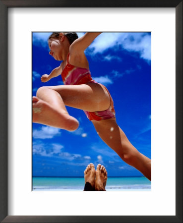 Girl Jumping Dad's Legs, Seychelles by Philip Smith Pricing Limited Edition Print image