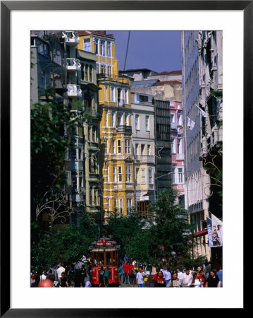 Tram And Crowds On Istiklal Caddesi, Beyoglu District, Istanbul, Turkey by John Elk Iii Pricing Limited Edition Print image