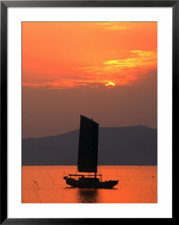 Fishing Boat Sailing Across Lake Taihu At Sunset, Wuxi, China by Keren Su Pricing Limited Edition Print image