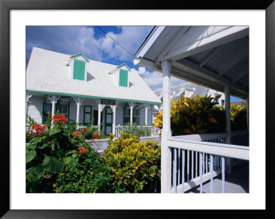 A View Of Loyalist Homes And Gardens In Dunmore Town, Dunmore Town, Harbour Island, Bahamas by Greg Johnston Pricing Limited Edition Print image
