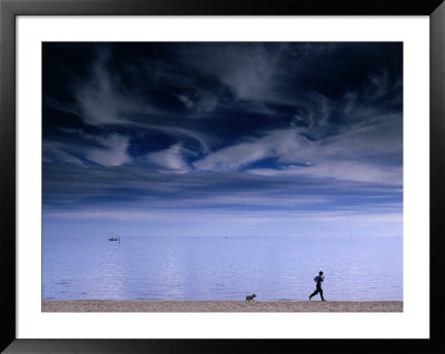 Jogger And Dog At South Melbourne Beach Before Storm, Melbourne, Australia by Regis Martin Pricing Limited Edition Print image