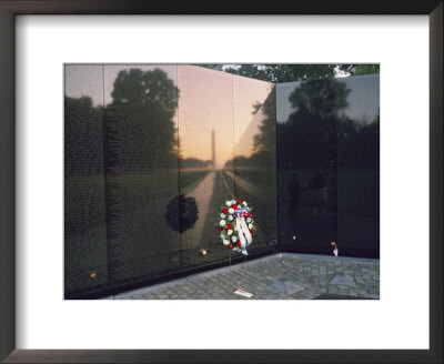 A Memorial Wreath Is Placed At The Base Of The Vietnam Veterans Memorial by Brian Gordon Green Pricing Limited Edition Print image