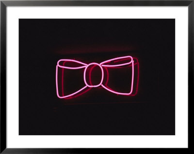 A Bright Pink Neon Bowtie Outside A Restaurant by Stephen St. John Pricing Limited Edition Print image