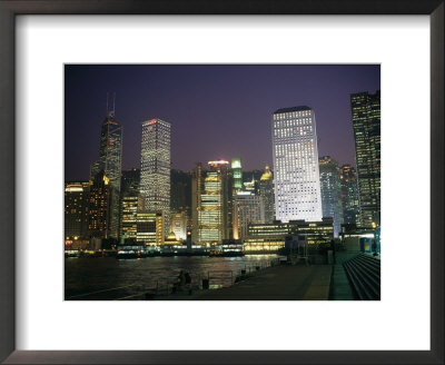 Star Ferry Terminal And Hong Kong Skyline At Night by Eightfish Pricing Limited Edition Print image