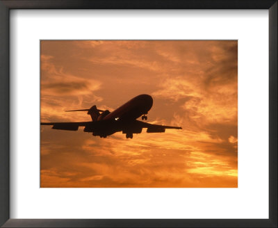 Silhouette Of Commercial Airplane At Sunset by Mitch Diamond Pricing Limited Edition Print image