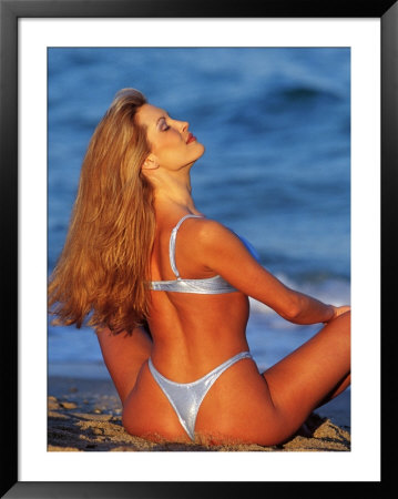 Woman In Bikini Sitting On Beach by Bill Keefrey Pricing Limited Edition Print image