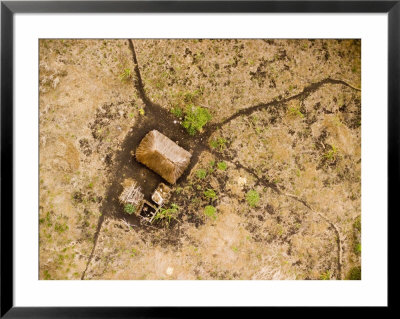 Single Family Thatch Roof House On The Plains, Tanzania by Michael Fay Pricing Limited Edition Print image