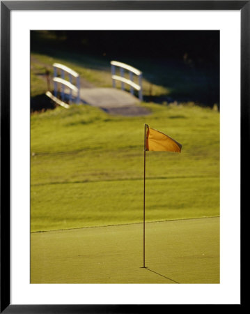 A Peaceful Putting Green And Footbridge On A Golf Course by Jason Edwards Pricing Limited Edition Print image