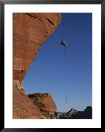 Rock Climbing In Sedona, Arizona by John Burcham Pricing Limited Edition Print image