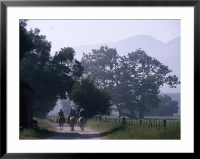 Cattlemen Riding Horses Along A Road At Rancho Sisquoc, Santa Barbara, California, Usa by Brent Winebrenner Pricing Limited Edition Print image