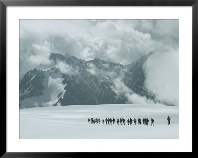 Hikers On A Snowfield Near Mount Elbrus by Dean Conger Pricing Limited Edition Print image