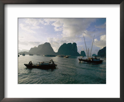 Sampans Ply The Placid Waters Of Halong Bay by Steve Raymer Pricing Limited Edition Print image