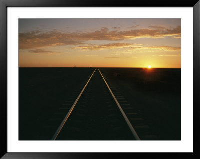 A View At Sunrise Of The Indian Pacific Railroad Crossing The Nullarbor Plain by Richard Nowitz Pricing Limited Edition Print image