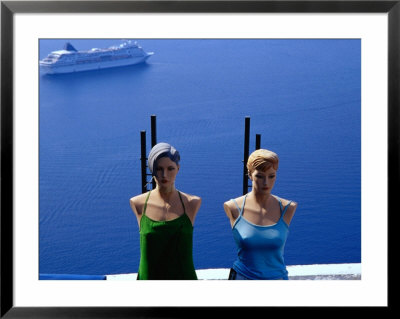 Armless Mannequins In Front Of Passing Ship, Fira, Greece by Glenn Beanland Pricing Limited Edition Print image