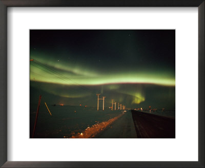 The Aurora Borealis Streaks Across The Evening Sky by Norbert Rosing Pricing Limited Edition Print image