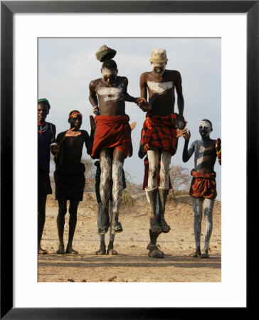 Men Wearing Traditional Body Paint In Nyangatom Village Dance, Omo River Valley, Ethiopia by Alison Jones Pricing Limited Edition Print image