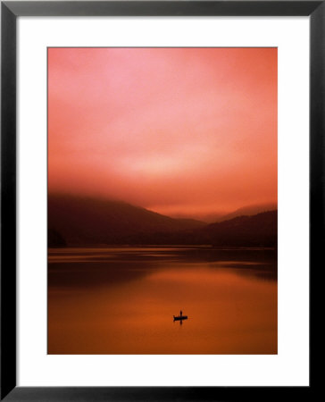 Person In Rowboat On Bavarian Lake, Germany by Thomas Winz Pricing Limited Edition Print image