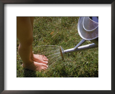 Watering Can Sprinkling Water On Child's Feet by Sally Moskol Pricing Limited Edition Print image