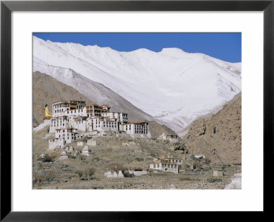 A Tibetan Temple Is Built Atop A Hill With The Himalaya Mountains As A Backdrop by Monika Klum Pricing Limited Edition Print image
