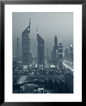 United Arab Emirates, Dubai, Sheik Zayed Road, Emirates Towers by Walter Bibikow Pricing Limited Edition Print image