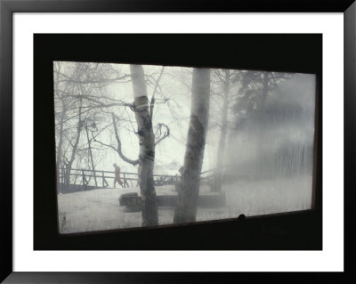 A View Looking Out Through A Steamy Window At A Winter Landscape by Jodi Cobb Pricing Limited Edition Print image