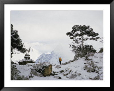 A Member Of The Mount Everest Expedition Stands Near A Stone Pagoda by Barry Bishop Pricing Limited Edition Print image