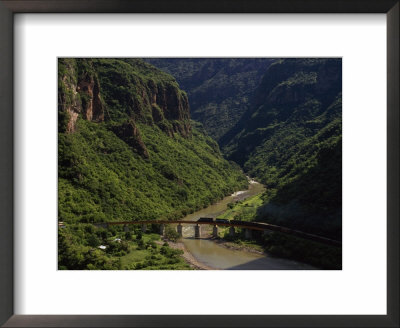 Train Crosses A Bridge At Temoris In Mexico's Copper Canyon Region, Chihuahua State, Mexico by Phil Schermeister Pricing Limited Edition Print image