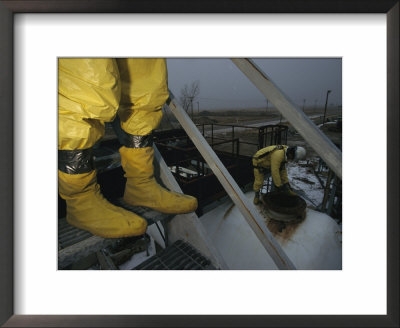 Men In Protective Clothing Check Hazardous Chemical Storage Tanks by Joel Sartore Pricing Limited Edition Print image