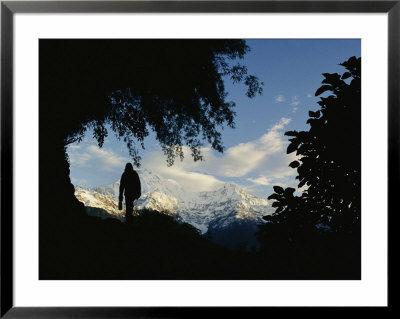 Silhouette Of A Hiker In Nepals Annapurna Range by Skip Brown Pricing Limited Edition Print image