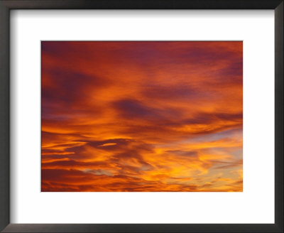 Sunset Fills The Cloud With Golden Red Color by Janis Miglavs Pricing Limited Edition Print image