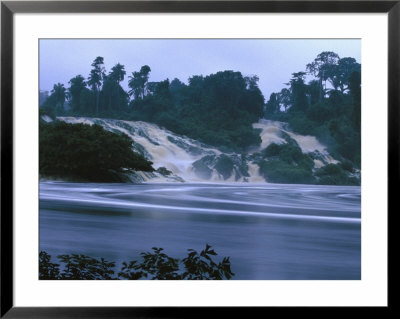 The Turbulent Waters Of Kongou Falls, Yellow With Eroded Soil by Michael Nichols Pricing Limited Edition Print image