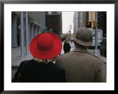 Rear View Of Two People Wearing Hats Stopped At A Crosswalk by Raul Touzon Pricing Limited Edition Print image