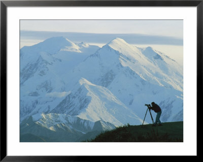 A Photographer Silhouetted Against Snow-Covered Mt. Mckinley by Joel Sartore Pricing Limited Edition Print image