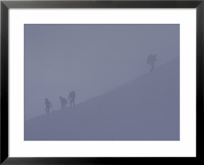 Climbers Are Barely Visible On The Cloudy Mountain Side by Paul Chesley Pricing Limited Edition Print image