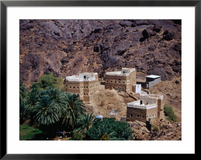 Traditional Mud Brick Houses Beneath Al-Aan Palace, Najran, Saudi Arabia by Tony Wheeler Pricing Limited Edition Print image