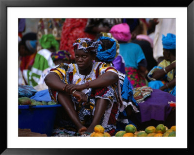 A Woman Selling Oranges At The Albert Market In Banjul, Banjul, Western, Gambia, The by Ariadne Van Zandbergen Pricing Limited Edition Print image
