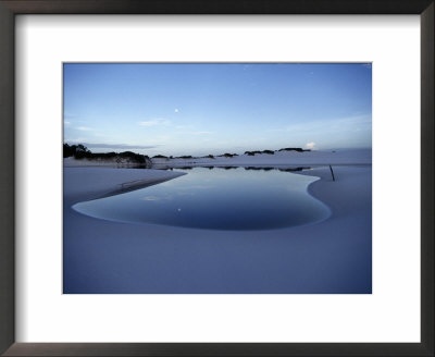 A White Sand Dune With A Pool Of Water Reflecting The Sky by Sam Abell Pricing Limited Edition Print image