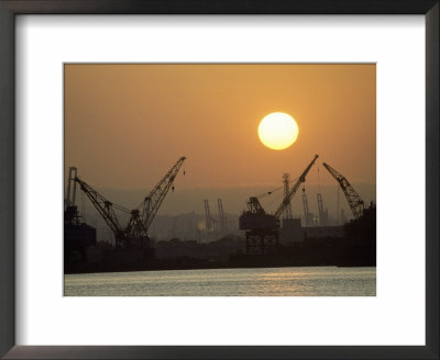 Silhouetted Gantries At Shipyard by Doug Mazell Pricing Limited Edition Print image