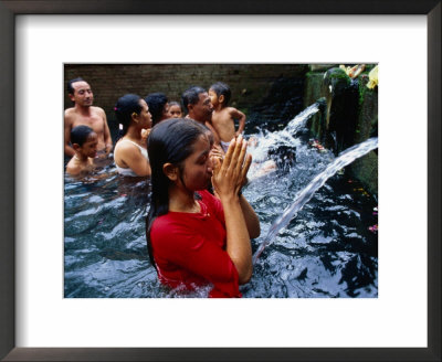 People Praying At Holy Water Ceremony, Spring Water Temple, Tampaksiring, Ubud, Indonesia by Michael Coyne Pricing Limited Edition Print image